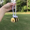 car hanging bee